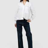 Pantaloni denim damă evazați din denim albastru stretch