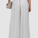 Pantaloni damă wide leg cu pliuri și buzunare alb
