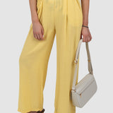 Pantaloni damă cu croială wide leg și talie elastică galben