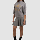 Pulover de damă cu stea decorativă și design elegant