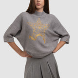 Pulover de damă cu stea decorativă și design elegant